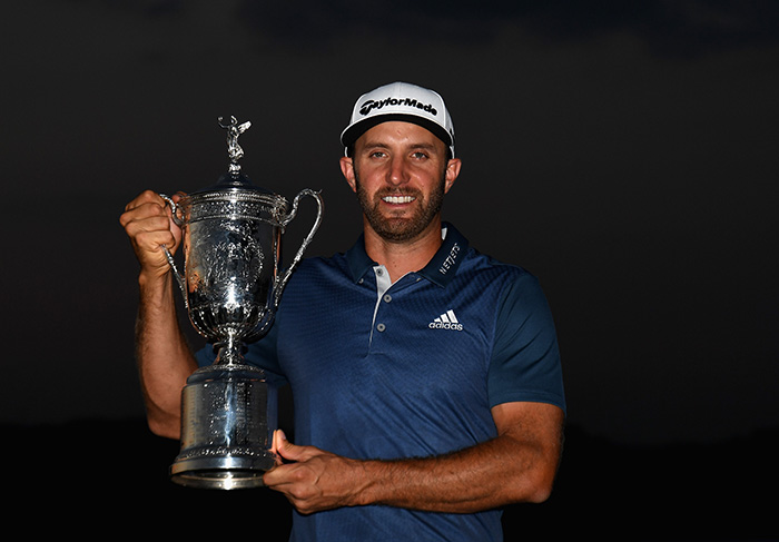 OAKMONT, PA - JUNE 19:  Dustin Johnson of the United States poses with the winner's trophy after winning the U.S. Open at Oakmont Country Club on June 19, 2016 in Oakmont, Pennsylvania.  (Photo by Ross Kinnaird/Getty Images)