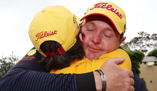 Jarrod Lyle of Australia hugs wife Briony Lyle