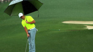 Rory McIlroy playing in the rain