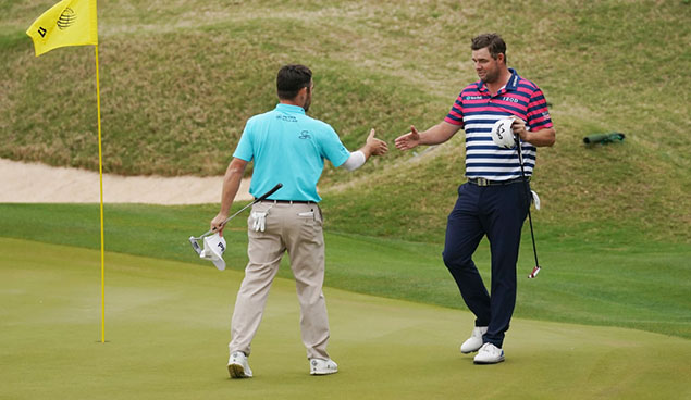 Louis Oosthuizen with Marc Leishman
