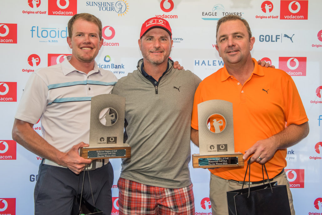 The Origins of Golf Humewood pro-am winners; Stephen Ferreira (left) and Ernst Kriek (right) flank Vodacom’s Travis Goate