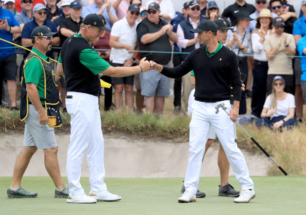 Ernie Els and Adam Scott