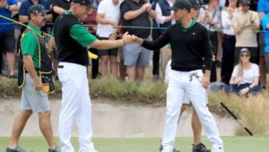 Ernie Els and Adam Scott