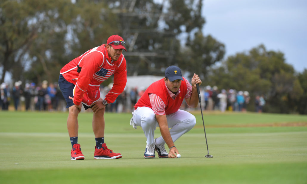 Patrick Reed and caddie Kessler Karain