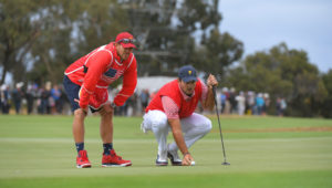 Patrick Reed and caddie Kessler Karain