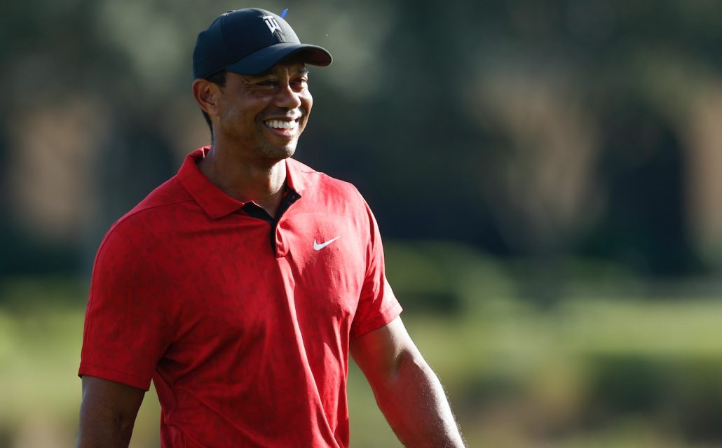 Tiger Woods smiles 19 Feb 22