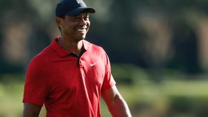 Tiger Woods smiles 19 Feb 22