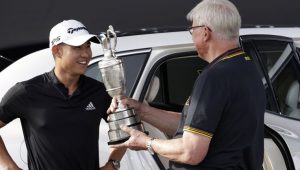 Collin Morikawa returns Claret Jug