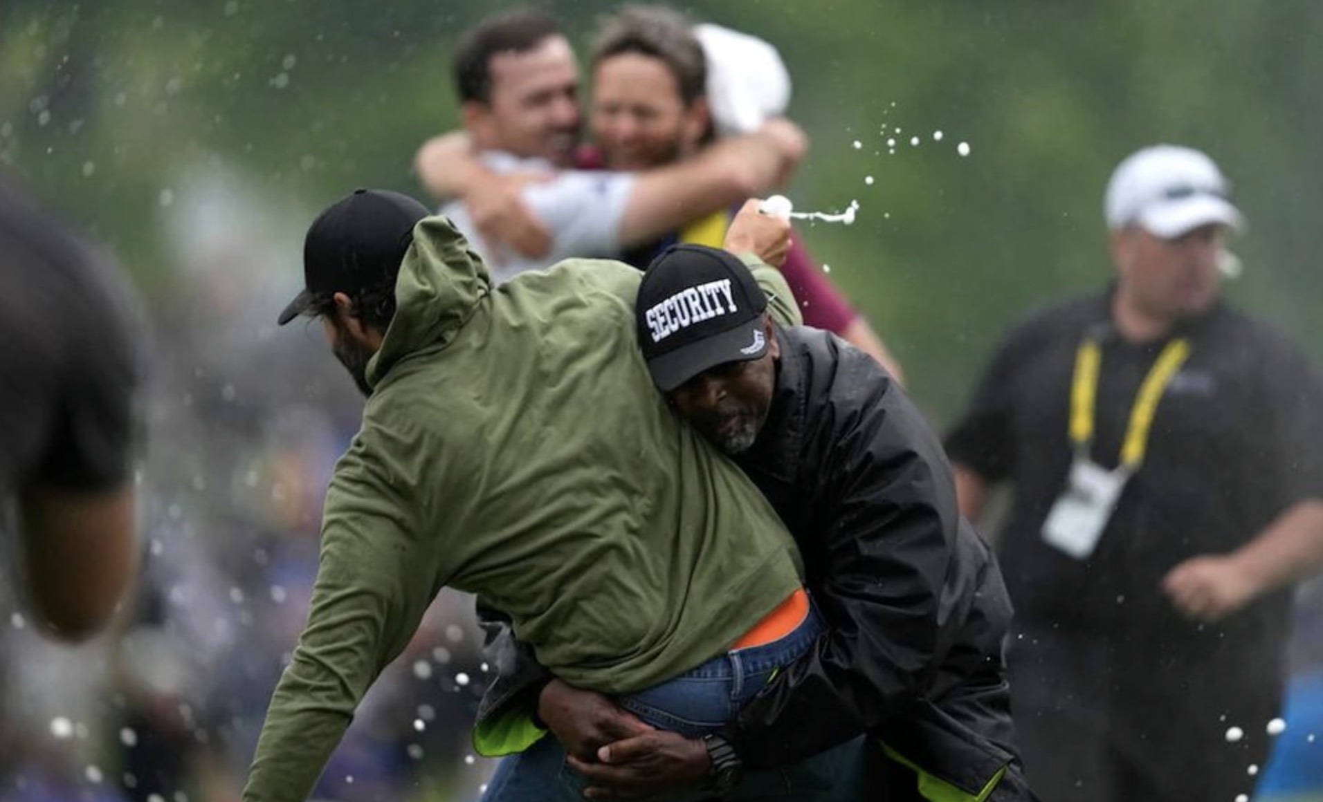 Adam Hadwin tackled