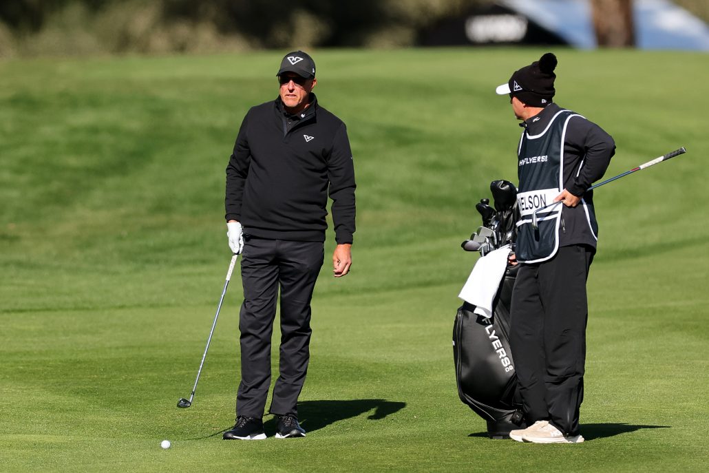 Mickelson unveils new caddie