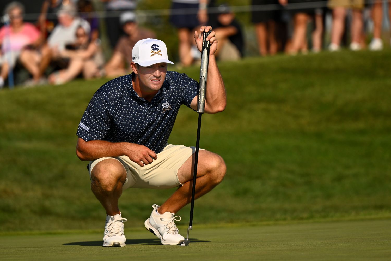 Bryson DeChambeau of the Crushers GC lines up his putt on the first hole during day one of LIV Golf: Chicago at Bolingbrook Golf Club on September 13, 2024 in Bolingbrook, Illinois. (Photo by Quinn Harris/Getty Images)