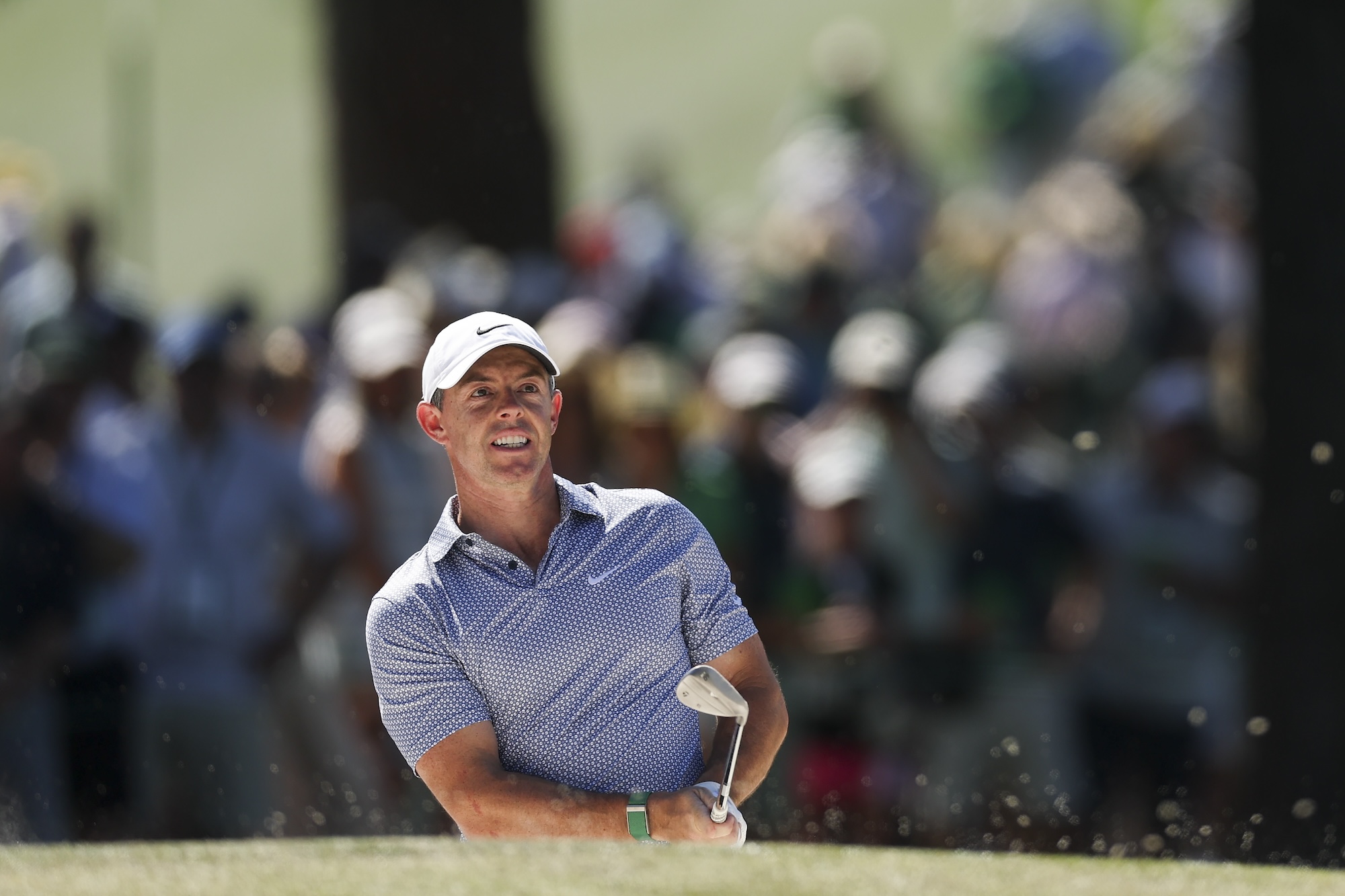 AUGUSTA, GEORGIA - APRIL 11: Rory McIlroy of Northern Ireland plays a shot from a bunker on the seventh hole during the third round of the 2026 Masters Tournament at Augusta National Golf Club on April 11, 2026 in Augusta, Georgia. (Photo by Maddie Meyer/Getty Images)